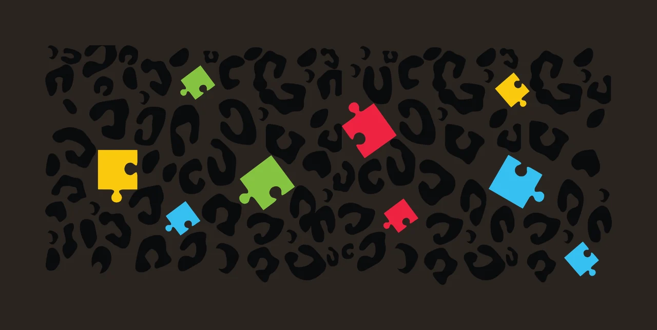 Leopard print pattern with autism awareness puzzle pieces Illustration with black leopard print, red puzzle piece, green puzzle piece and blue puzzle piece contrast preview thumbnail